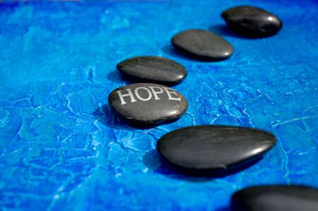 Line of stones with engraved word の写真素材