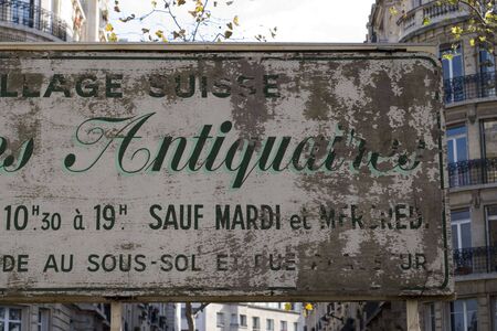 weathered sign at the street in Paris/Franceの写真素材