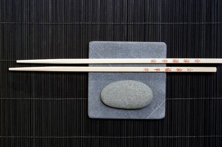 Asia still life with chopstick and pebbleの写真素材