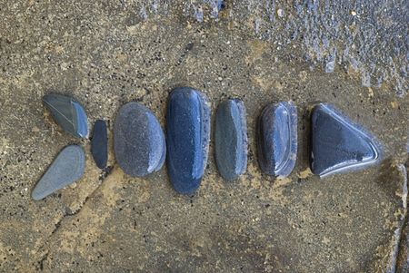 fisch made of gray pebbleの写真素材