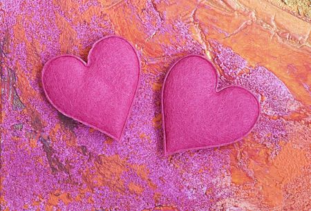 two pink hearts on textured backgroundの写真素材