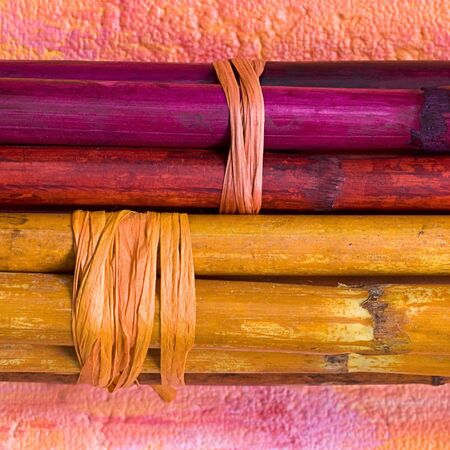 bundle of colorful bamboo sticksの写真素材