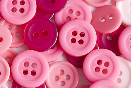 close up of many pink buttonsの写真素材