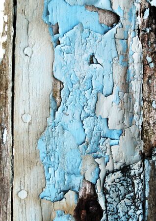 wooden plank with blue peeling paintの写真素材