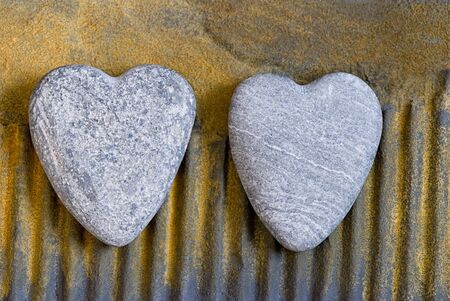 stone heart on rusty surfaceの写真素材
