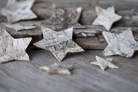 christmas stars on wooden backgroundの写真素材