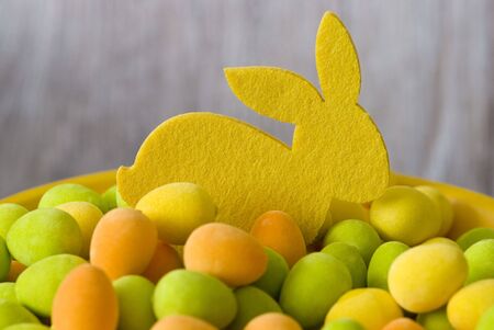 felt easter bunnies and colorful eggsの写真素材