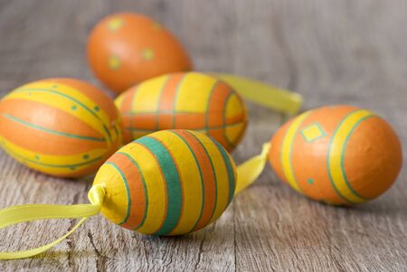 colorful easter eggs on wood