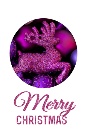 Pink glitter deer ornament and Christmas greetings on white backgroundの写真素材