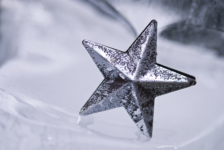 Christmas star on iceの写真素材