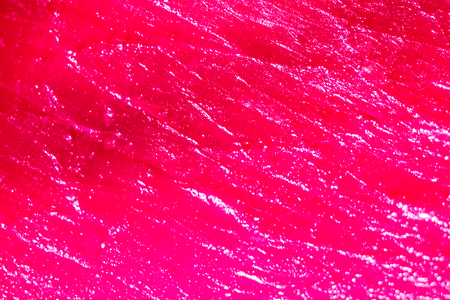 mistery waves of coral red texture of spanish ham, jamon meat texture as abstract background, lines of ham meat texture, abstract texture of parallel long lines nature colorの写真素材