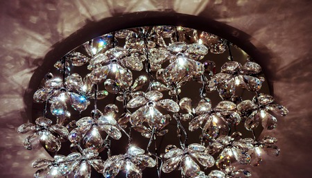 crystal clean flowers as blanks for making jewelry in sunshine. beautiful lamp with brillliant...