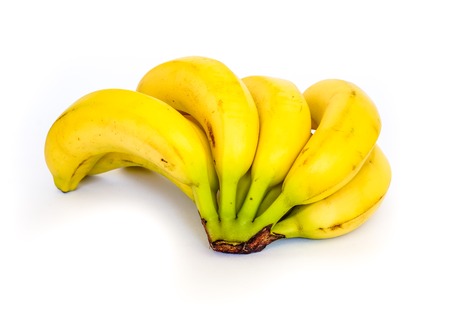 side back view to black bananas' tips on yellow sunny banana ripes. Bunch of bananas isolated on white background. eight sweet organic fresh bananas in one big brunch.の写真素材