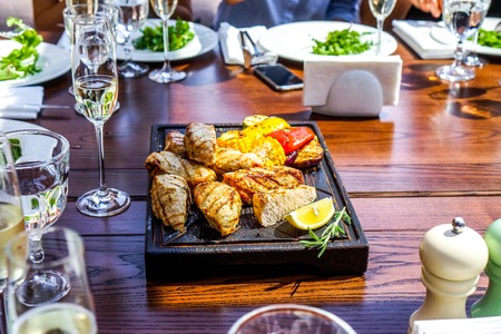 tomatoes, violet onions,peppers, maize zucchini grilled and get into restaurant wooden desks. roasted vegetables as dish in restaurant. stir fried mixed vegetable in oyster sauceの写真素材