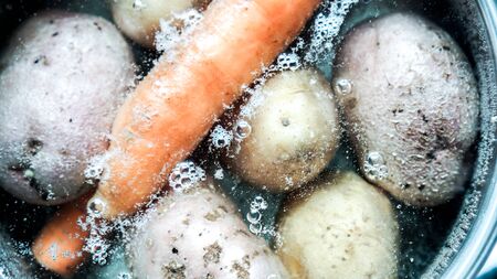 carrot and potatoes boil in water