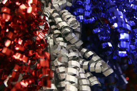Red, white and blue festive curls. Closeup of holiday ribbons.