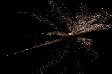 Colorful fireworks against a pitch black sky.の写真素材