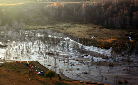 Morning fog shrouded riverbedの写真素材