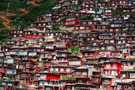 Red house on the hill are Tibetan Buddhist Institute at Sertar, Chinaの写真素材
