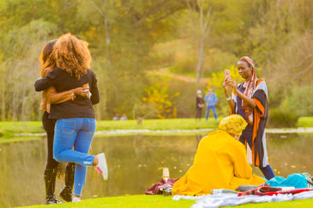 Johannesburg, South Africa - May 12 2018: Friends taking a selfie photo at food and wine festivalのeditorial素材