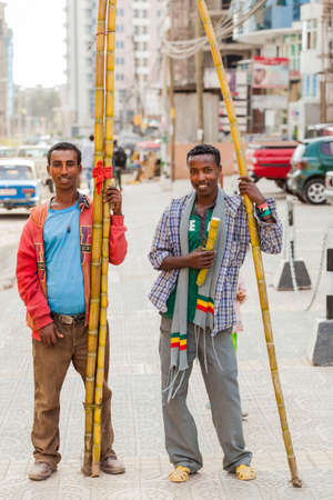 Addis Ababa, Ethiopia, January 27, 2014, Men selling sugarcane on the streetのeditorial素材