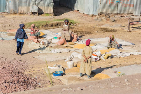 Addis Ababa, Ethiopia, January 30, 2014, Grain salesmen on the side of the road