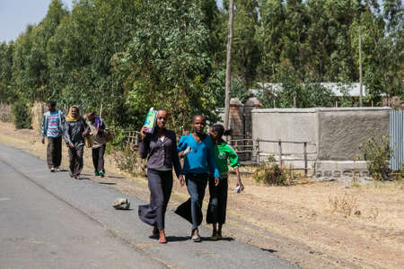 Addis Ababa, Ethiopia, January 30, 2014, Girls walking down a road