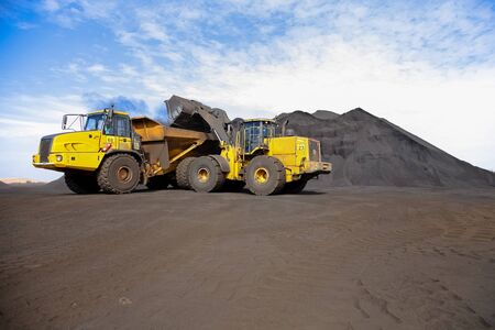 Mining Dump Truck transporting Manganese ore for processing and storage