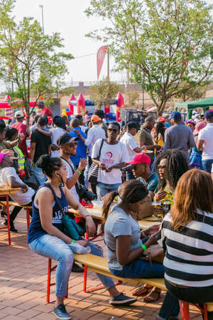 Soweto, South Africa - September 17, 2017: Diverse African people at a bread based street food outdoor festivalのeditorial素材