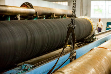 Johannesburg, South Africa - October 19, 2012: Inside interior of a rubber and pipe fabrication assembly line in a factoryのeditorial素材