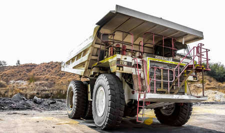 Witbank, South Africa - July 25 2011: Large Dump Trucks transporting Coal ore for processing