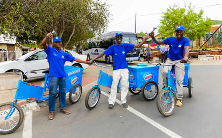 Johannesburg, South Africa, September 19, 2013, Vendors on bicycles selling ice cream cones in Soweto tourist areaのeditorial素材