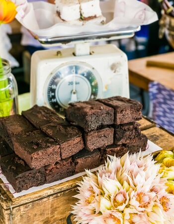 A Stack of Chocolate Brownies on a wooden box for display purposes. の写真素材