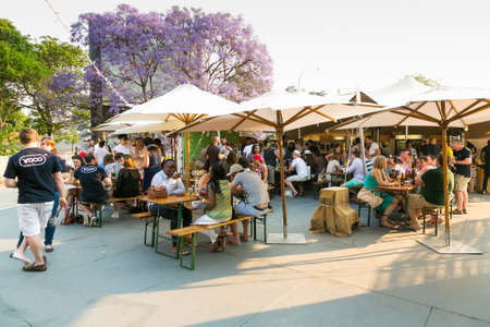 Johannesburg, South Africa - October 10 2015: Diverse Friends eating, drinking and generally enjoying a day out at a Food and Wine Fairのeditorial素材