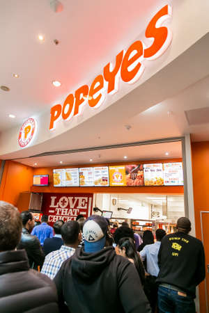 Johannesburg, South Africa - July 13 2017: Customers at a Popeyes Take Out Fast Food Restaurant