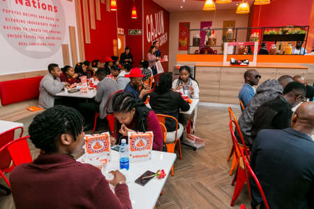 Johannesburg, South Africa - July 13 2017: Customers at a Popeyes Take Out Fast Food Restaurant