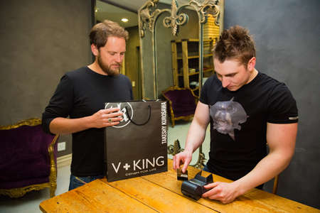 Johannesburg, South Africa - July 23 2013: Men Shopping for clothing in Upmarket Mall