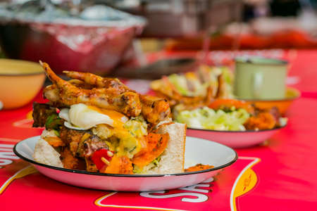 Soweto, South Africa - September 17, 2017: Close up of Traditional African bread based street food called Bunny Chow at outdoor festivalのeditorial素材