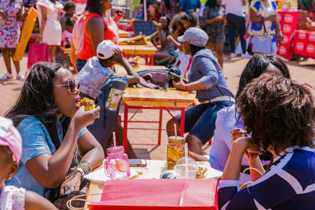 Soweto, South Africa - September 17, 2017: Diverse African people at a bread based street food outdoor festivalのeditorial素材