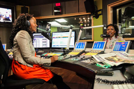 Johannesburg, South Africa - September 03, 2010: African Female Guests being interviewed on live talk radio showのeditorial素材