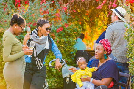 Johannesburg, South Africa - May 12 2018: Diverse People at an outdoor Food and Wine Festival