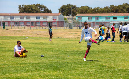Cape Town, South Africa, December 06, 2011, Diverse children playing soccer football at schoolのeditorial素材