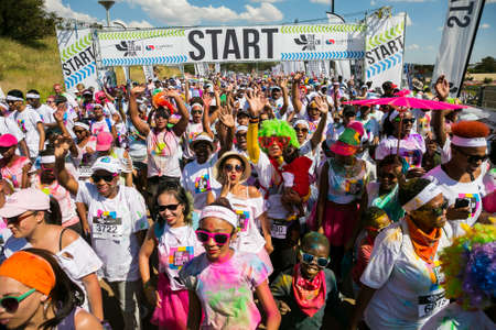 Soweto, South Africa, April 17, 2017, Diverse people running in The Color Run Marathon in Soweto