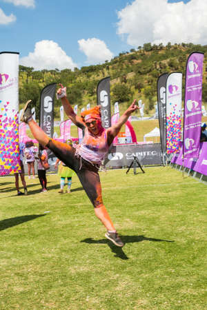 Soweto, South Africa, April 17, 2017, Diverse people running in The Color Run Marathon in Soweto