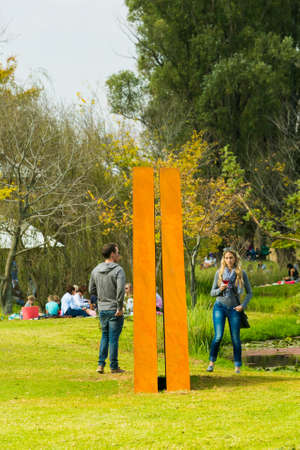 Johannesburg, South Africa - May 09 2015: People admiring a piece of art at Nirox Sculpture Parkのeditorial素材