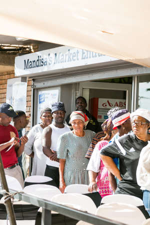 Johannesburg, South Africa - November 22, 2016: Customers waiting in line at entrance to local Pick...