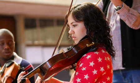 Johannesburg, South Africa - August 28 2010: Diverse youth at music school orchestraのeditorial素材