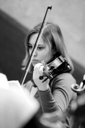 Johannesburg, South Africa - August 28 2010: Diverse youth at music school orchestra