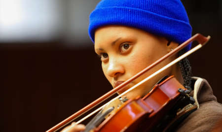 Johannesburg, South Africa - August 28 2010: Diverse youth at music school orchestraのeditorial素材