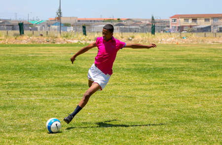 Cape Town, South Africa, December 06, 2011, Diverse children playing soccer football at schoolのeditorial素材